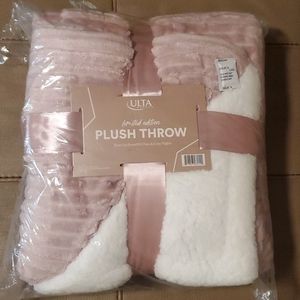 Pink plush throw blanket